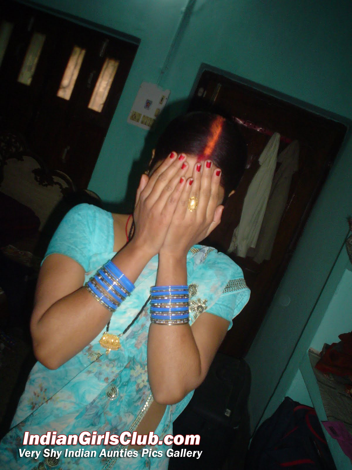 shy indian aunty camera posing